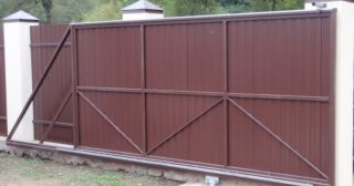 Купить откатные ворота из профнастила Усинск, цена от 1768 руб.